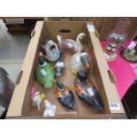 A box containing a quantity of ornamental ducks
