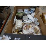 A box containing general crockery