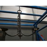 A wrought iron 3 branch ceiling candle holder