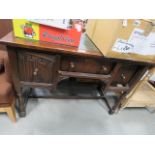 Oak desk with green leather surface