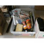 5538 - A box containing vintage tinned Russian dolls, fabric, slides and books