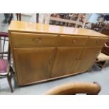 Ercol sideboard three drawers, three doors under