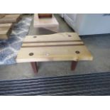 A natural wood coffee table