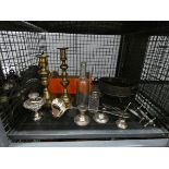 Cage of loose cutlery, brass candlesticks, a punch ladle, knife rests and silver candlesticks (af)