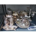 A cage containing a silver tray, loose cutlery, plus teapots, vases and a candlestick