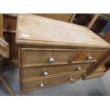 Stripped pine chest of two over two drawers