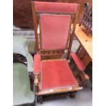 Rocking chair with red fabric seat and back