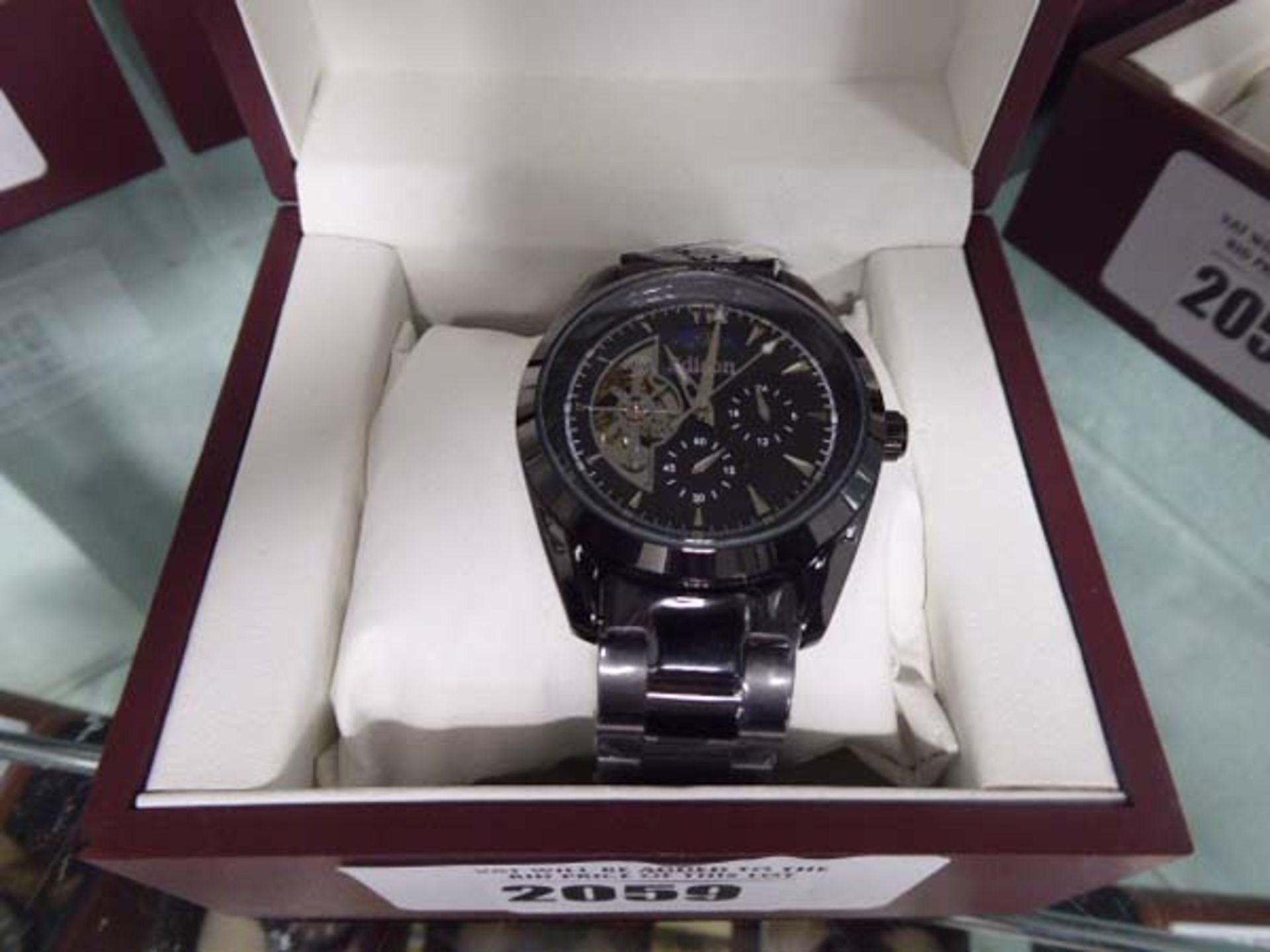 Gents Edison black strapped, black dial moon face watch with box