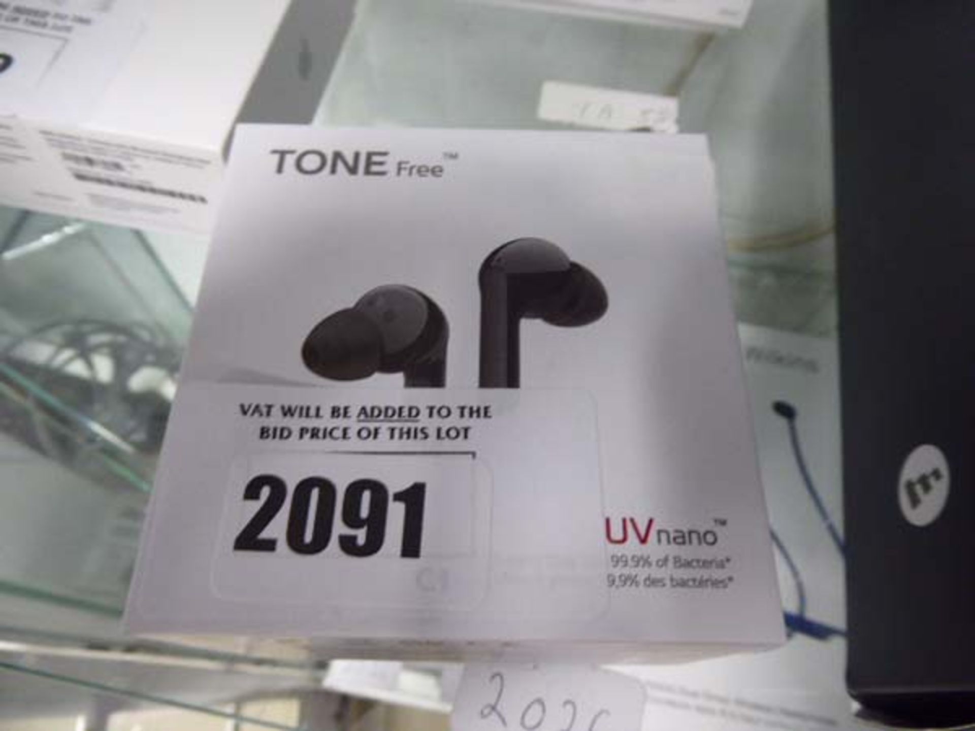 LG Tone free UV nano wireless headset with charging case and box