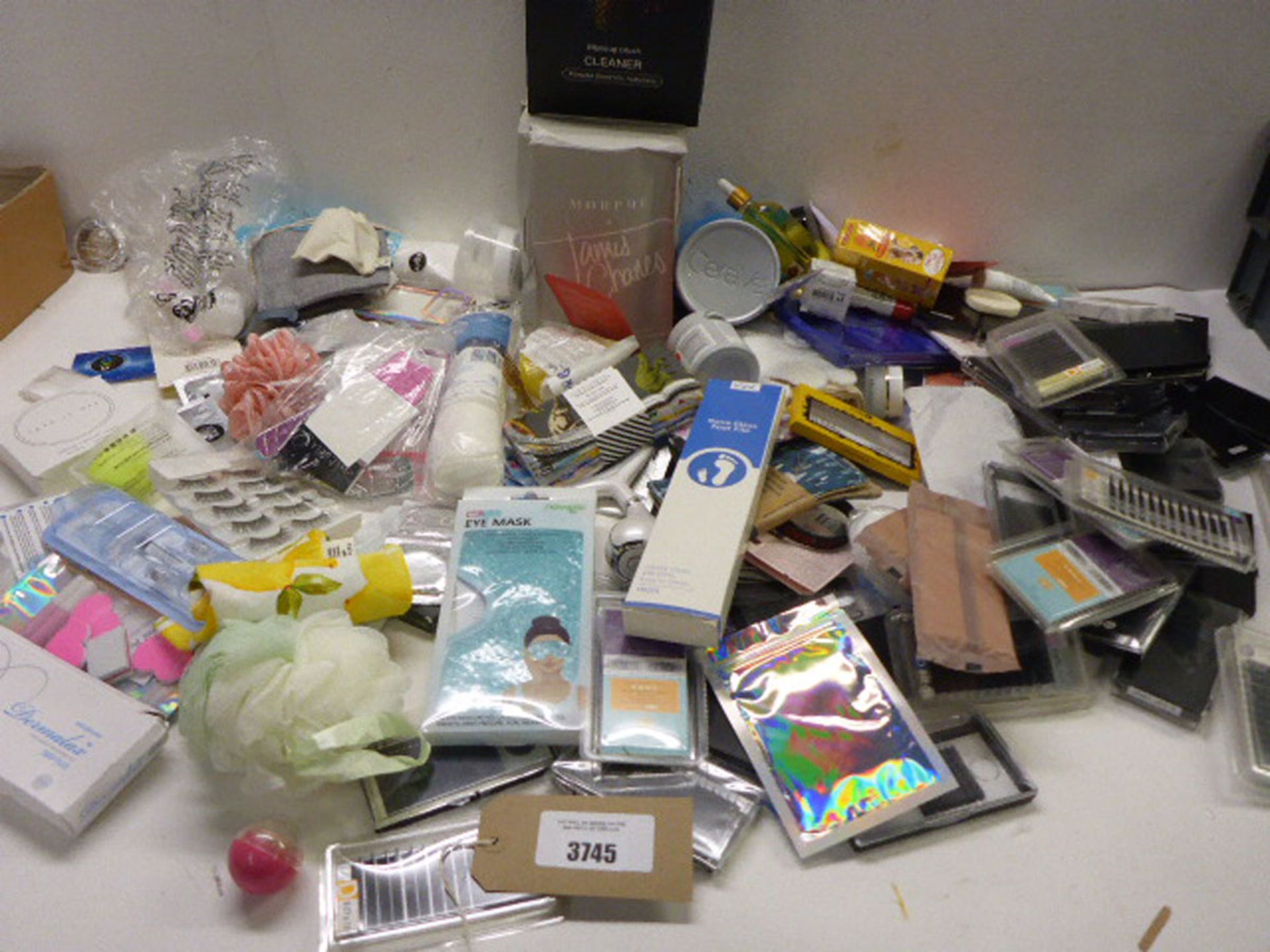 Large bag of beauty products including false eyelashes & nails, nail files & nail art, makeup