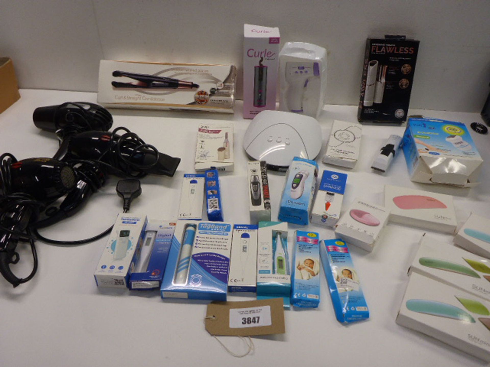 Hair stylers, nail lamps, digital thermometers, massager, 3 used hair dryers etc