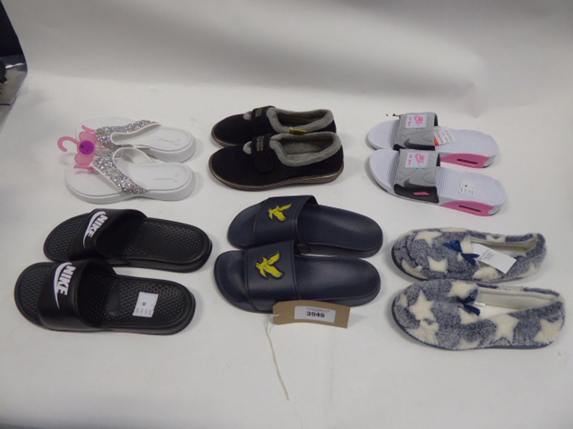 Bag of assorted slippers, sandals and walking shoes