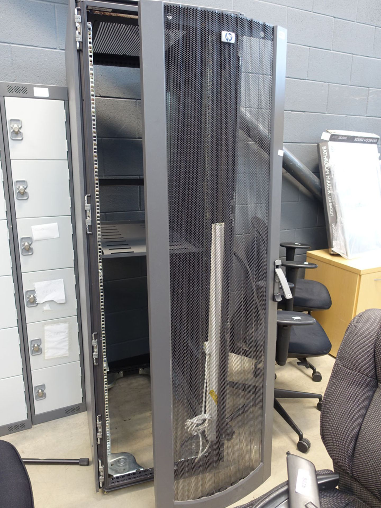 Large grey metal HP comms cabinet