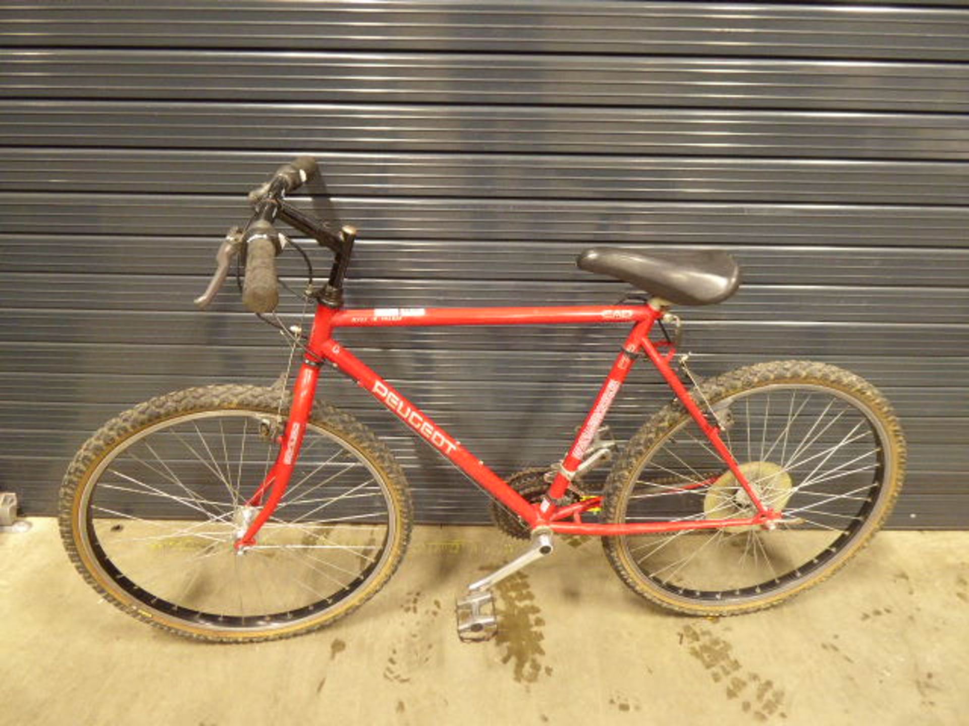 Peugeot red gents mountain cycle