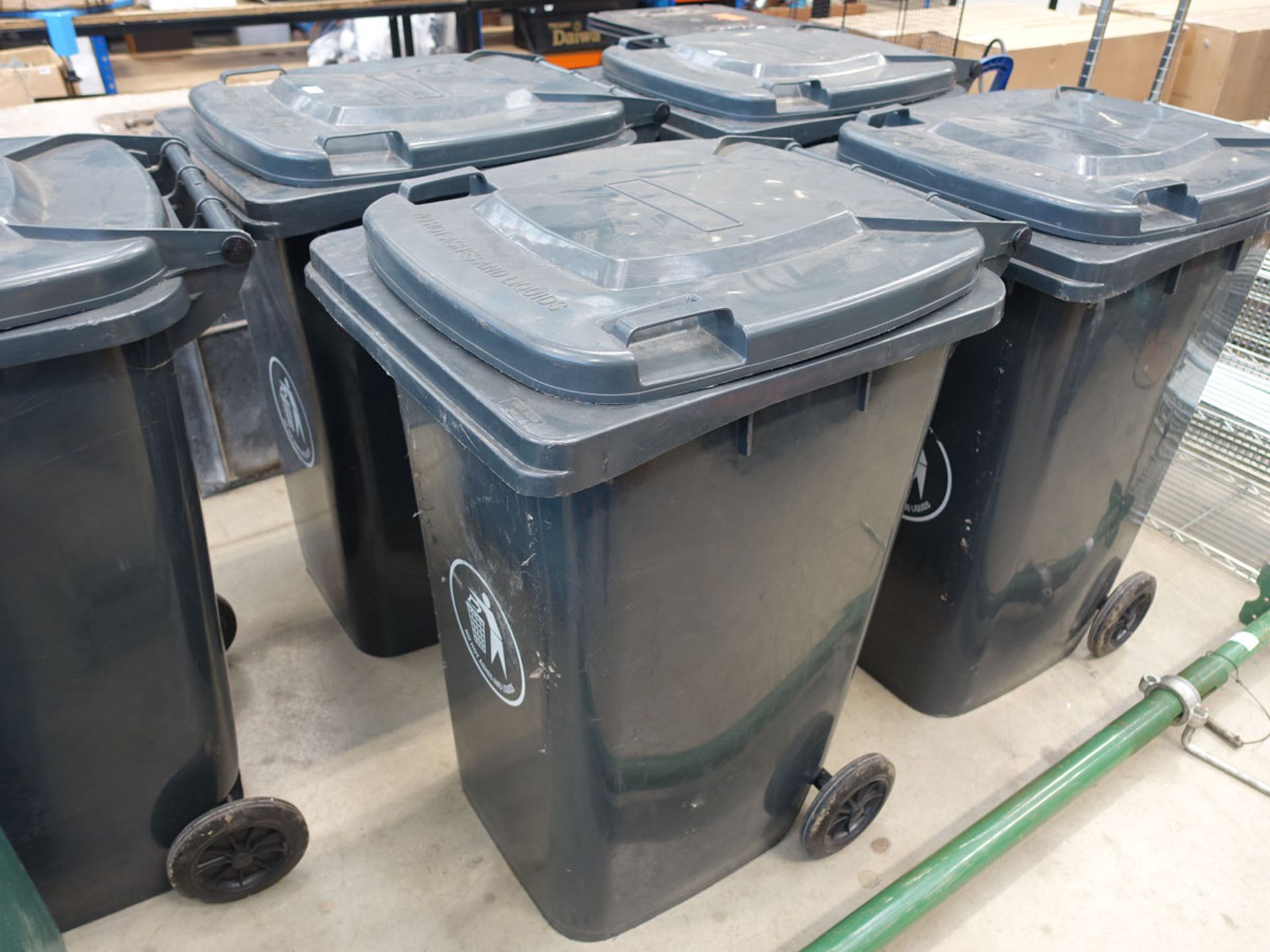 2 grey rubbish bins