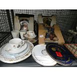 Cage containing commemorative wear and collectors plates