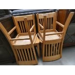 Four beech dining chairs