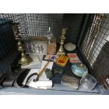 Cage containing brass candle sticks, toys, post cards, and ephemera