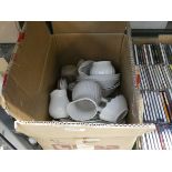 Box containing a quantity of crockery