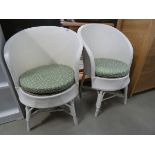 Pair of cream painted Lloyd Loom style chairs