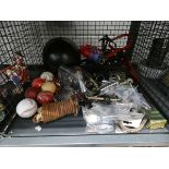 Cage containing baseballs and cricket balls plus horse bits and snaffles