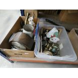 2 boxes containing a dome topped mantle clock, brassware, ornaments, table lamp, loose cultery and