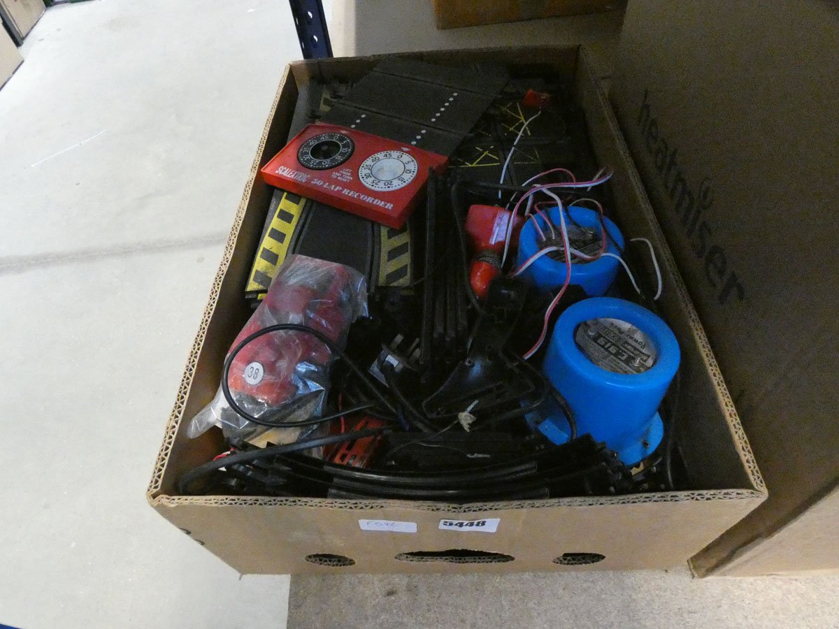Box containing Scalextric track, switches and cars