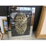 Abstract gilt wall hanging with mirrored frame