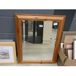 Rectangular bevelled mirror in pine frame