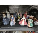 Cage containing Doulton and other ornamental ladies