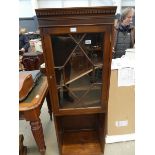 Glazed single door display cabinet with shelf under