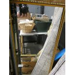 Narrow mirror in guilt frame