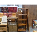 Cane and wicker display stand with double door cupboard under plus an open fronted pine bookcase