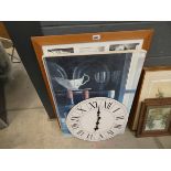 Circular quartz clock, modern wall hanging with wine bottles, multipaneled picture frame and a