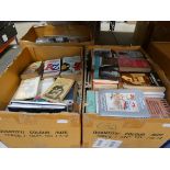 7 boxes containing a large quantity of paperback novels, art and other reference books