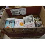 Box containing paper back novels