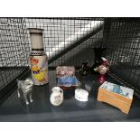 Cage containing an ornament of a Labrador with pheasant, crested ware, studio pottery and dishes