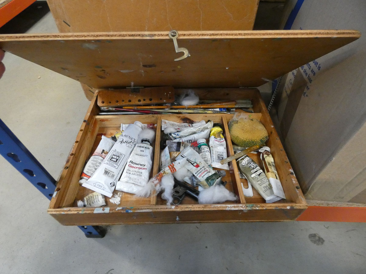 Box containing oil paints