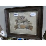 Framed and glazed picture formed from dried seaweed