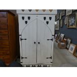 White painted double door cupboard