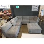 Six piece grey fabric corner sofa to include a footstool