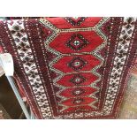 (33) Bokhara style red Pakistani mat