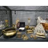 Cage containing faux crystal lamp shades, brass dishes, ornaments and candle sticks