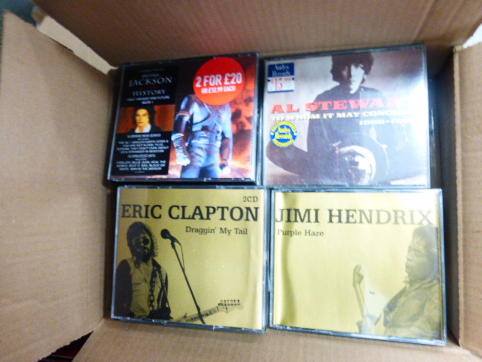 Cardboard box with a selection of various CD's to inc. Michael Jackson, etc