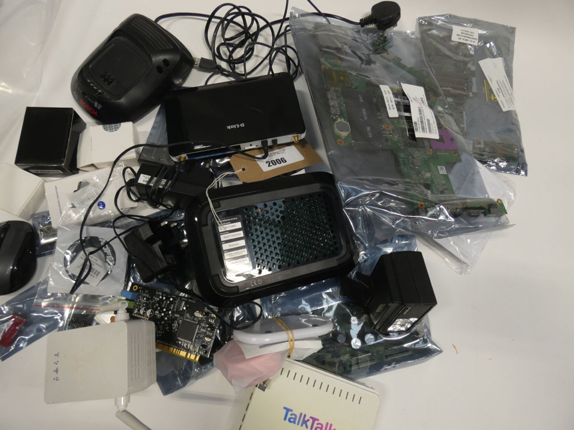 Bag containing various electrical related devices/accessories; routers, headset, spare boards, mouse