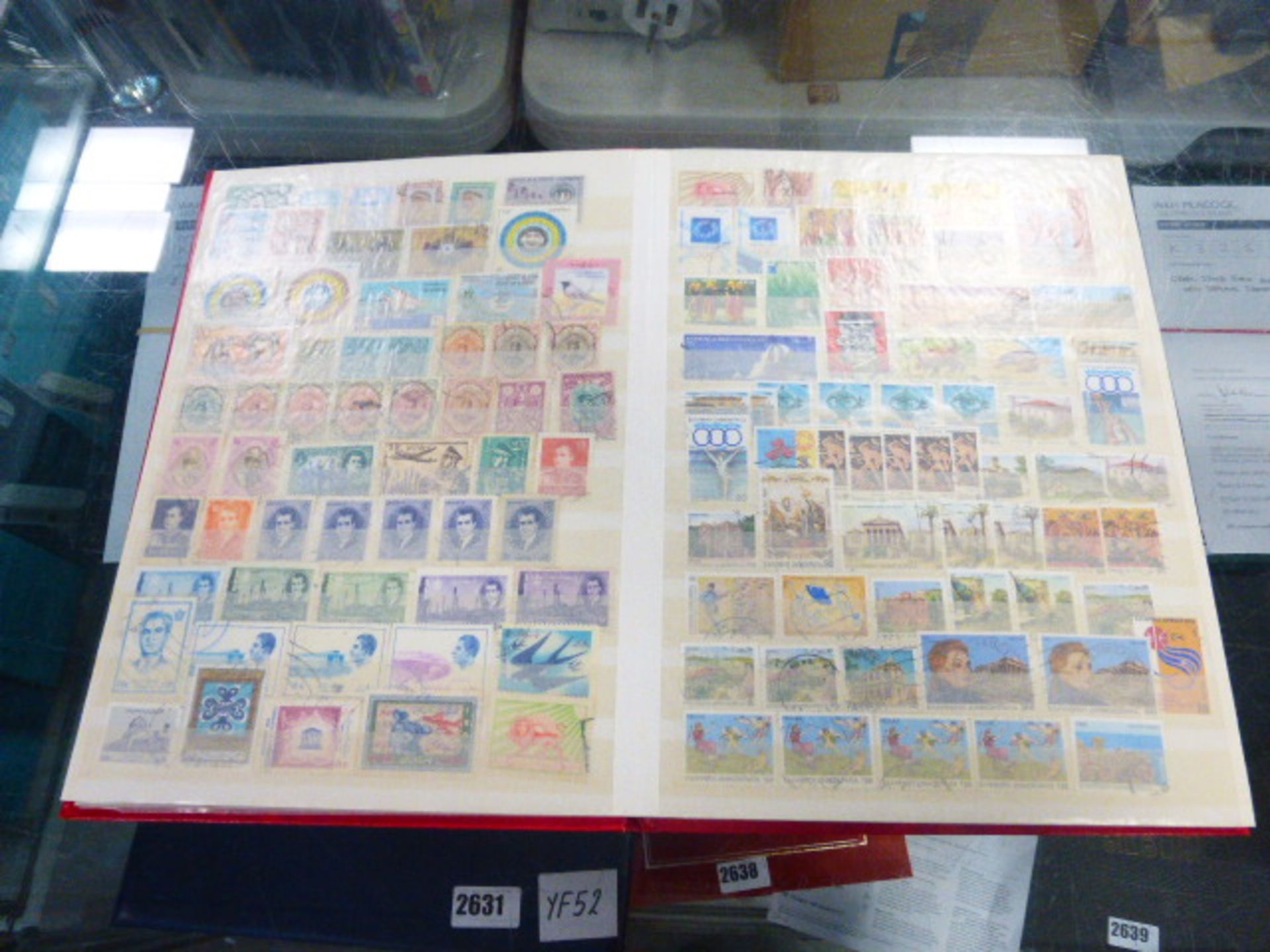 Red stock of World stamps inc. China, Japan, etc