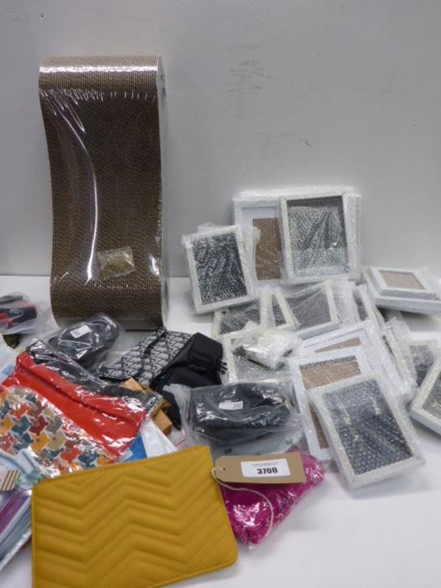 Cat scratch, varying size picture frames and selection of bags