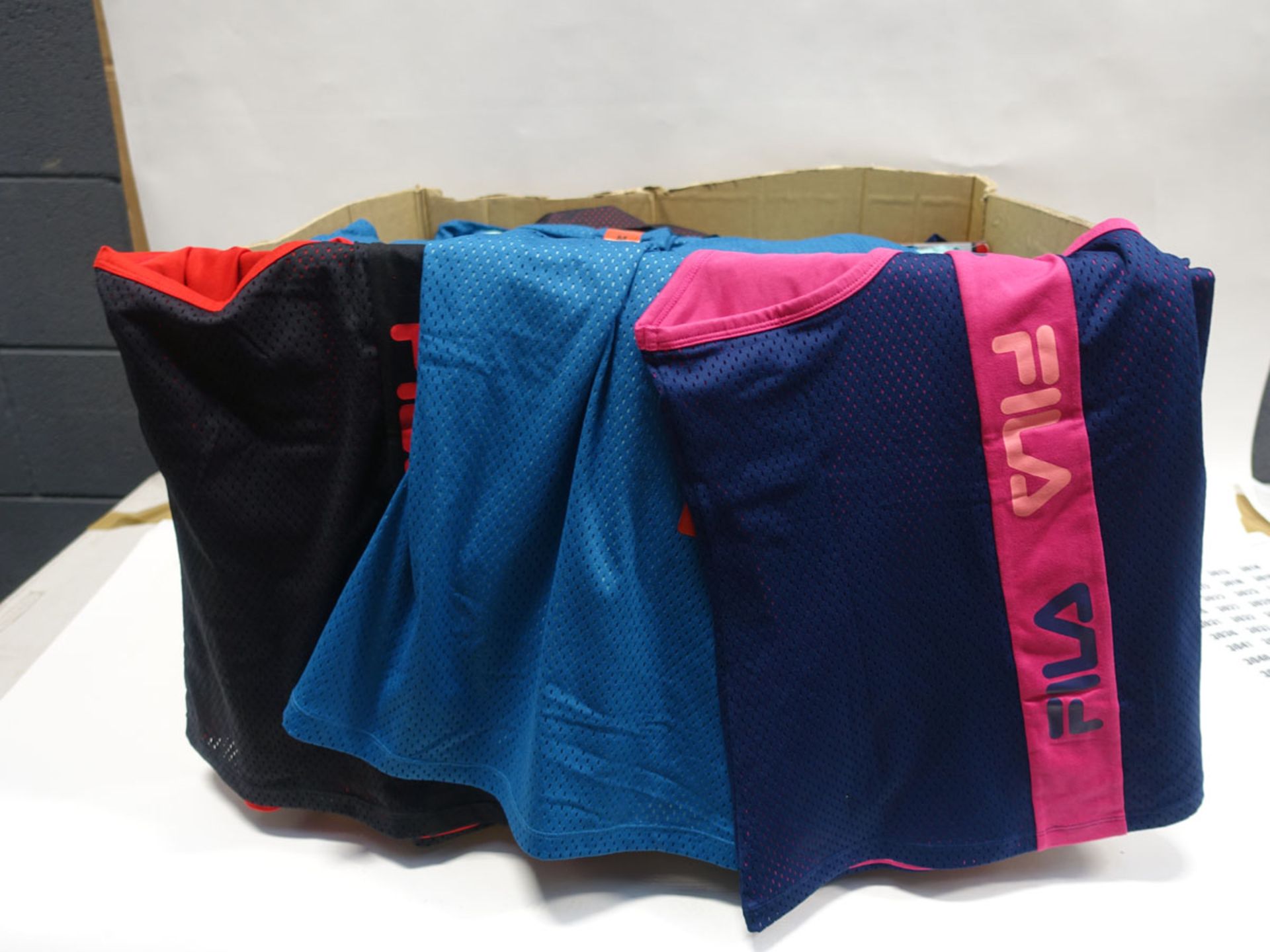 Box containing approx 160 Fila ladies mesh overlay tank tops sizes varying from large to small in