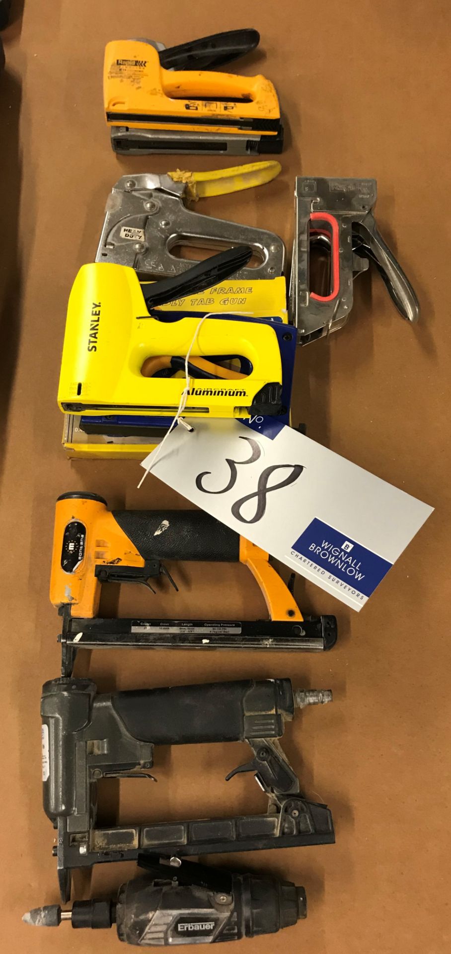 10 Staple Guns: 2 pneumatic, 8 manual with Erbauer Pneumatic Tool.