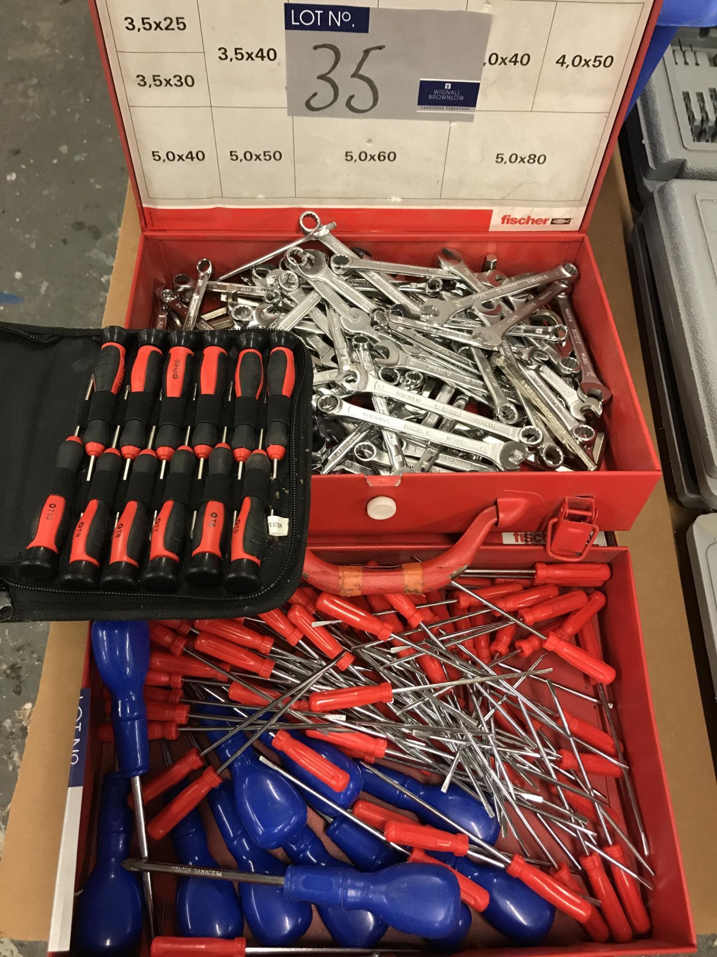 A Quantity of Screwdrivers and Open Ended Spanners in two boxes.